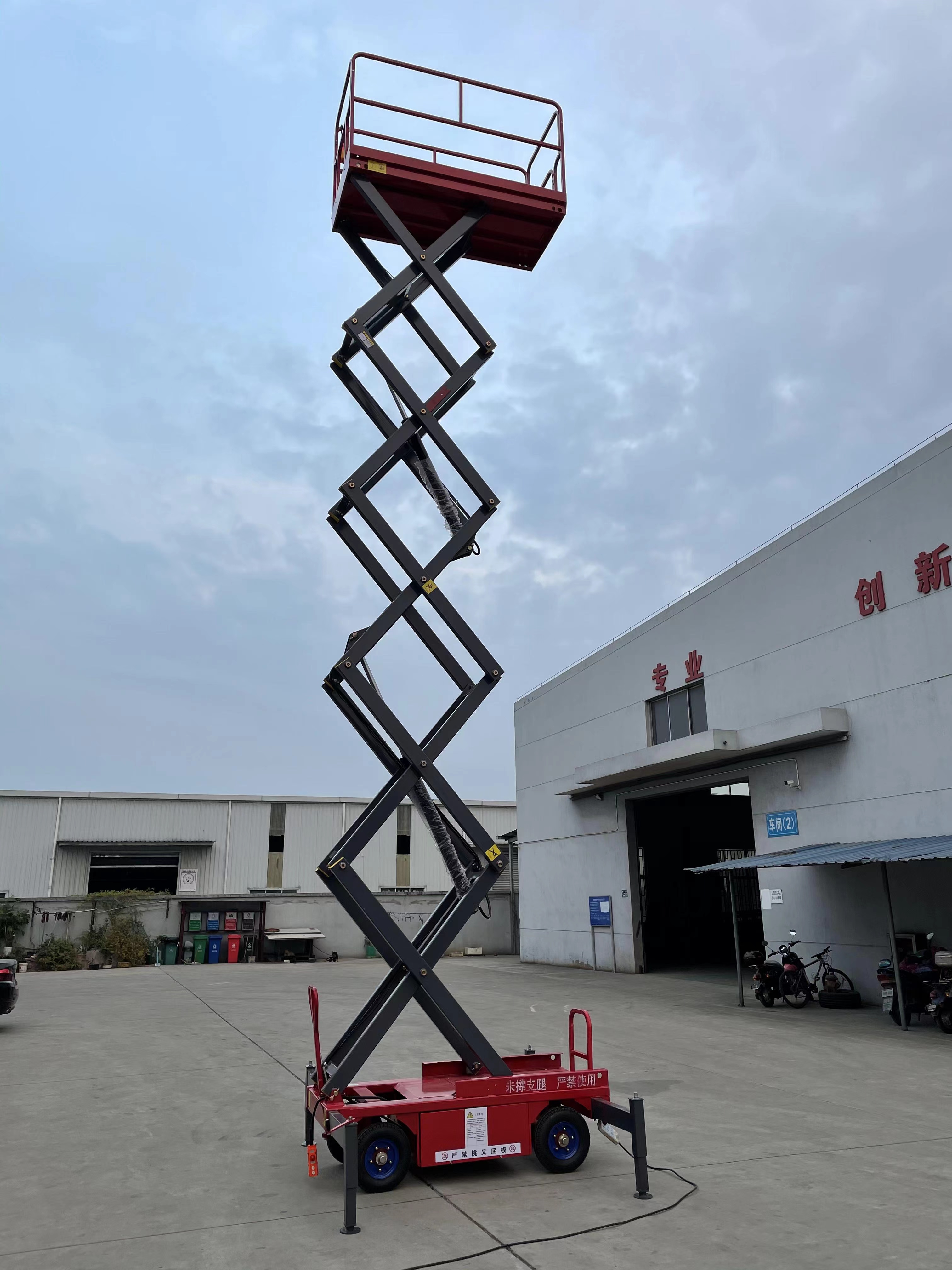 KAD10m 320Kg Electric mobile scissor hydraulic lifting platform for aerial work Mobile platforms